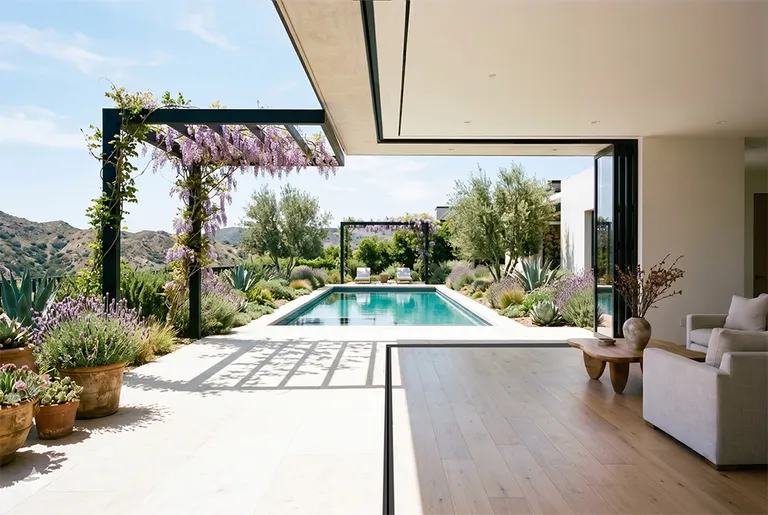 Lavender gabled home with FlowDoors open to the exterior